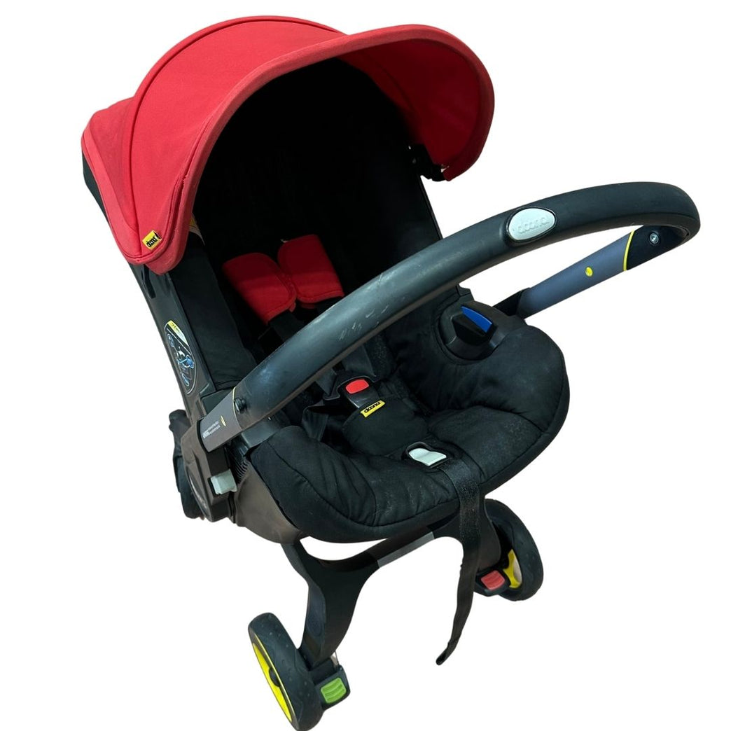 Doona Stroller - Flame Red with Footmuff, Newborn Insert & Snap On Storage