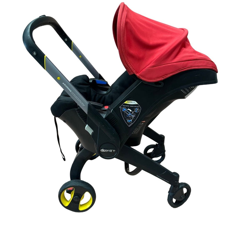 Doona Stroller - Flame Red with Footmuff, Newborn Insert & Snap On Storage